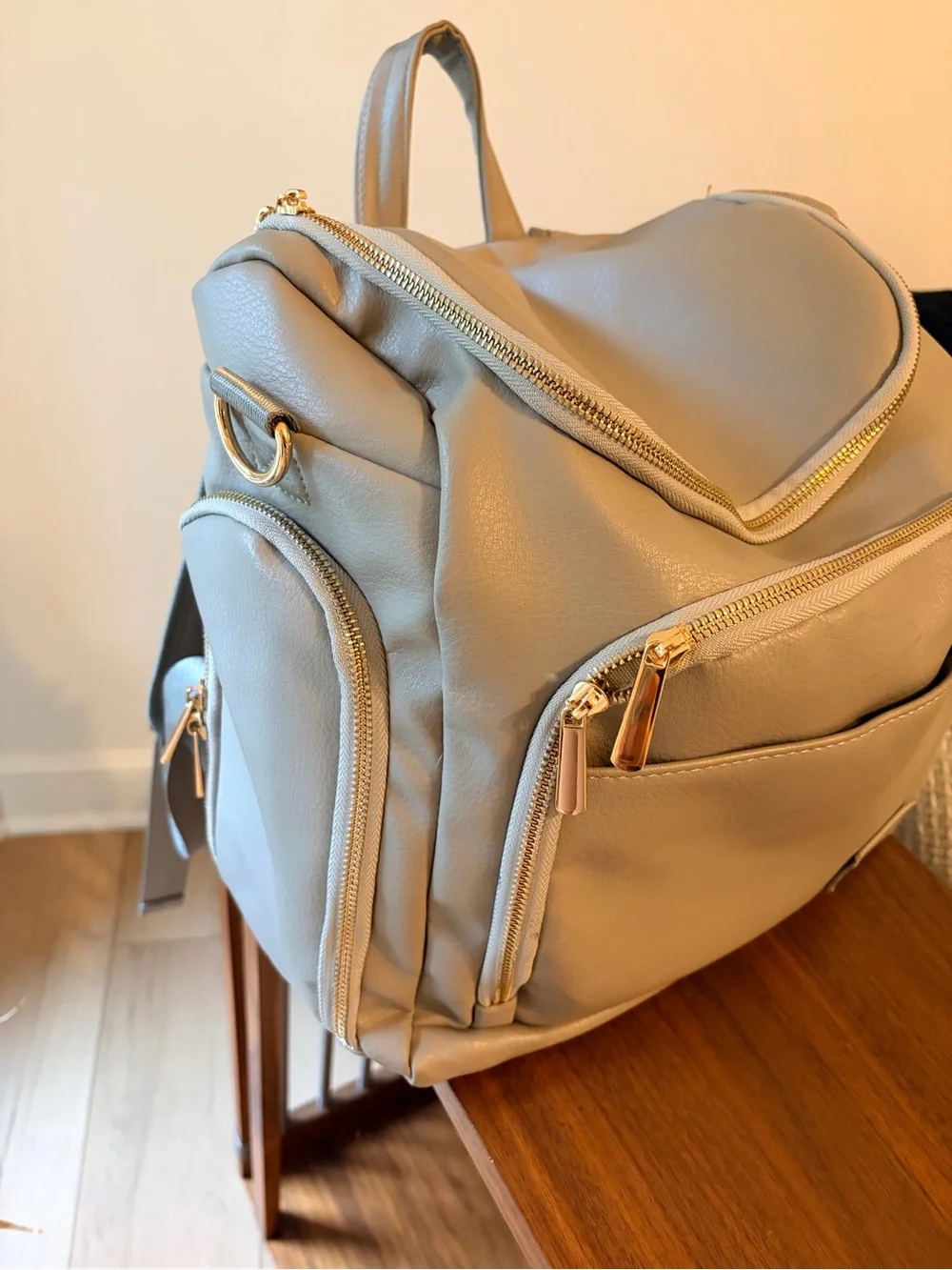 Stylish Cream Baby Bag Backpack with Gold Hardware